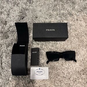 Prada Elegant Black Sunglasses Set